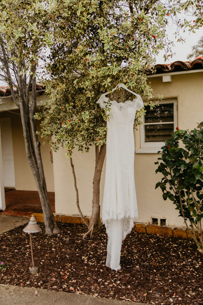 A music festival themed wedding at The Inn at Rancho Santa Fe, lace sleeved wedding dress