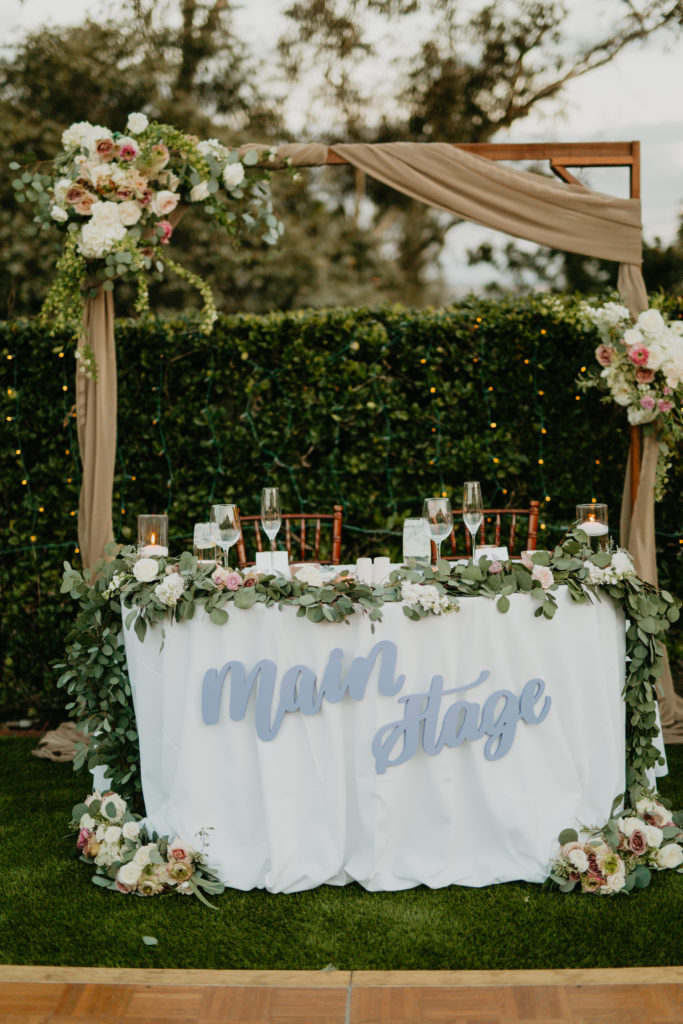 A music festival themed wedding reception at The Inn at Rancho Santa Fe, main stage sweetheart table
