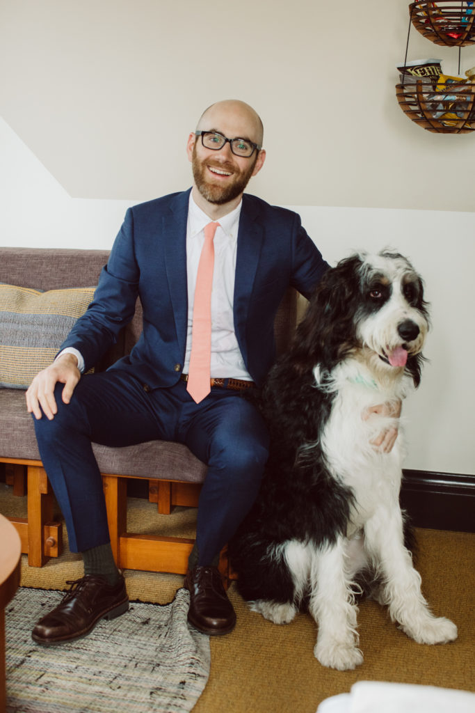 A unique and colorful wedding at the Grass Room in downtown Los Angeles, groom portrait shot with dog