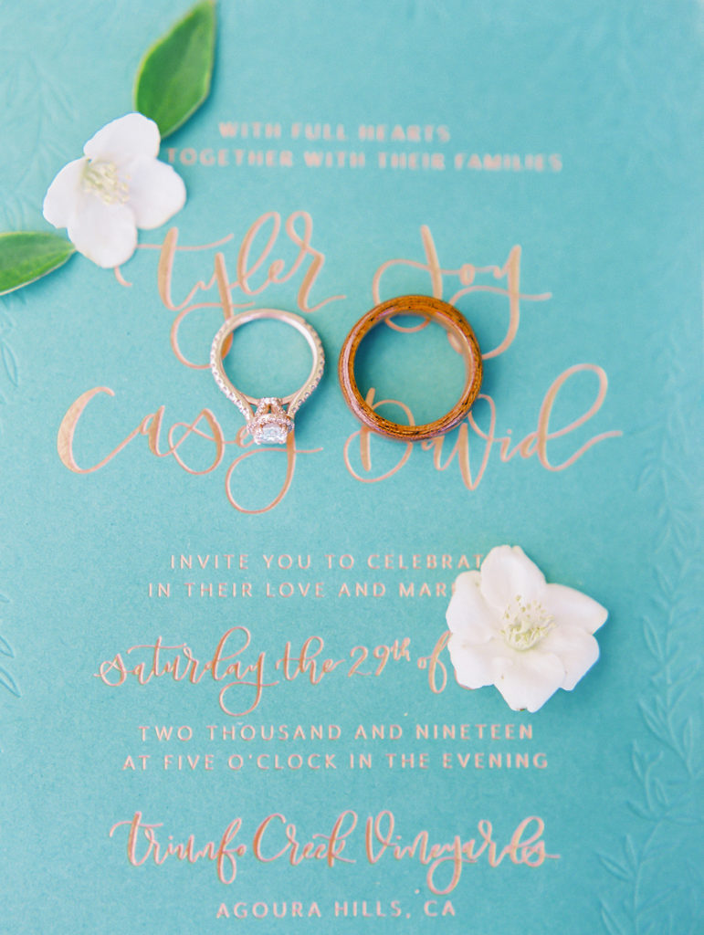A colorful and vibrant wedding at Triunfo Creek Vineyards, teal wedding invitation 