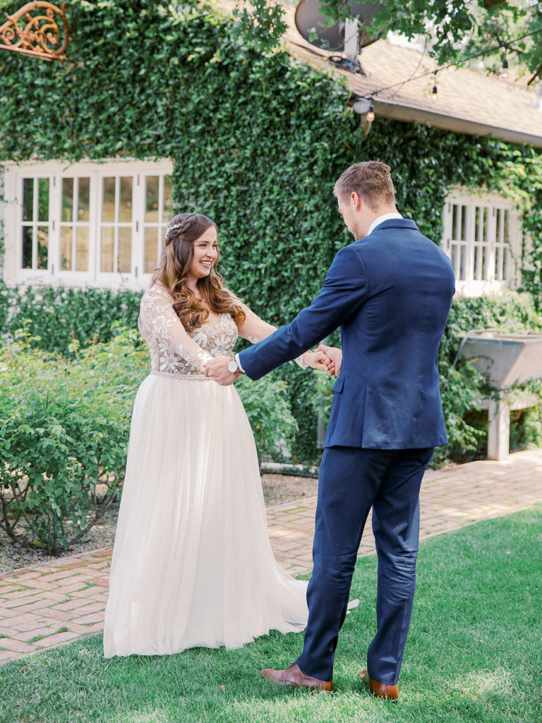 A colorful and vibrant wedding at Triunfo Creek Vineyards, bride and groom first look