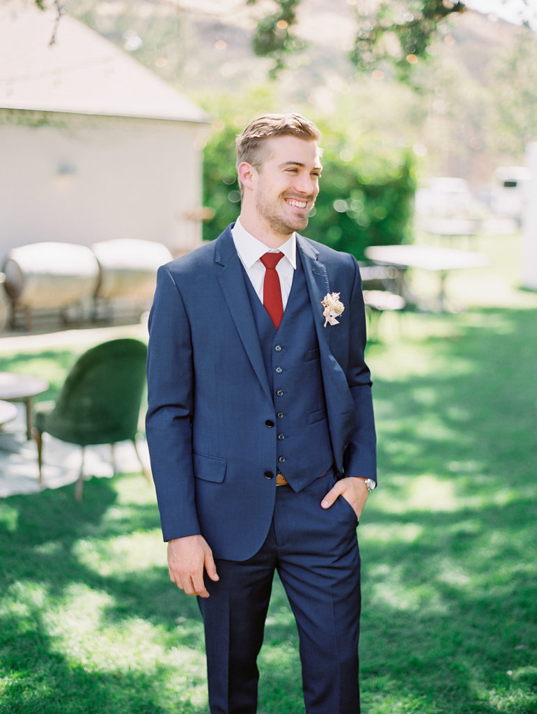 A colorful and vibrant wedding at Triunfo Creek Vineyards, groom portrait shot