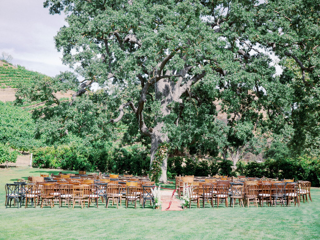 A colorful and vibrant wedding ceremony at Triunfo Creek Vineyards