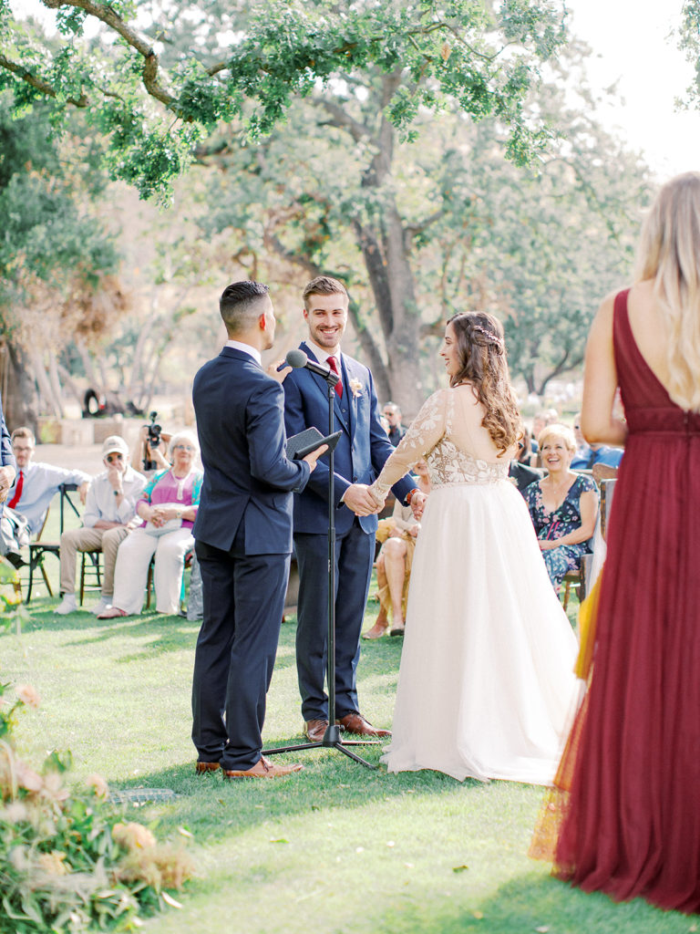 A colorful and vibrant wedding ceremony at Triunfo Creek Vineyards