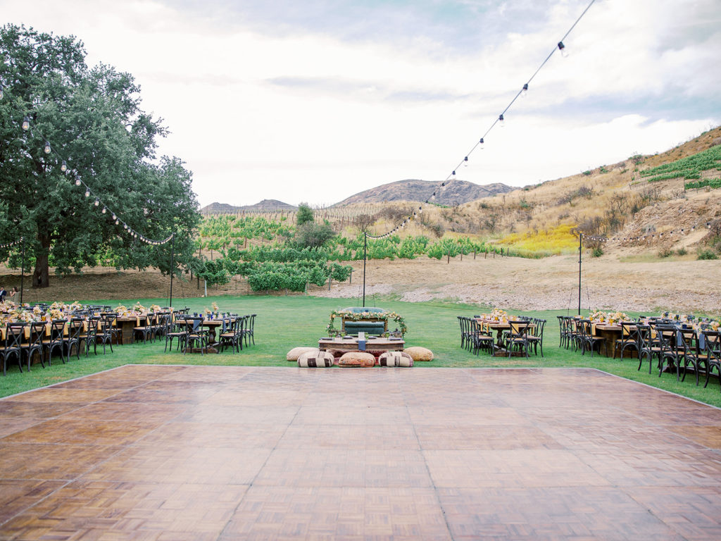 A colorful and vibrant wedding reception at Triunfo Creek Vineyards