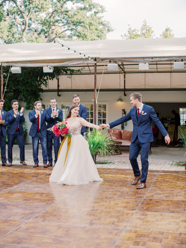 A colorful and vibrant wedding at Triunfo Creek Vineyards, bride and groom first dance