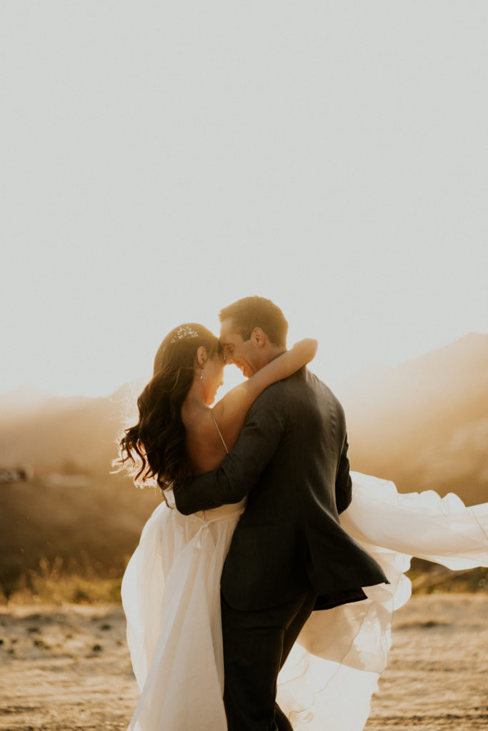 A whimsical wedding at Triunfo Creek Vineyards, sunset bride and groom portrait