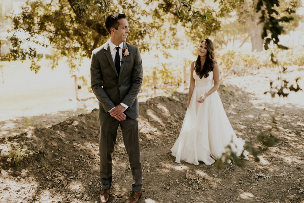 A whimsical wedding at Triunfo Creek Vineyards, bride and groom first look