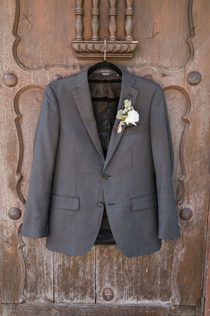A Romantic Forest Inspired Wedding at the 1909, groom suit detail shot