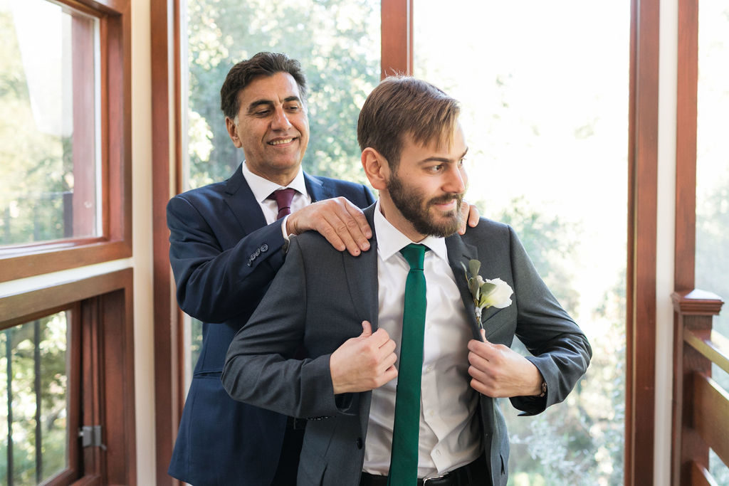 A Romantic Forest Inspired Wedding at the 1909, groom getting ready with groomsmen
