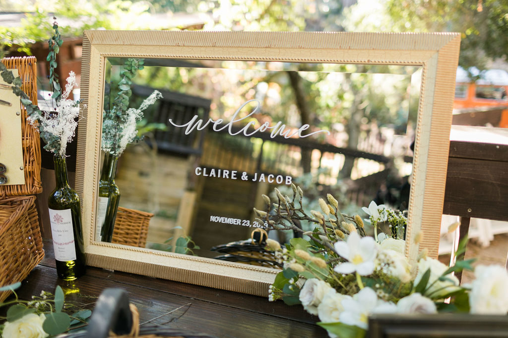 A Romantic Forest Inspired Wedding at the 1909, mirror welcome sign