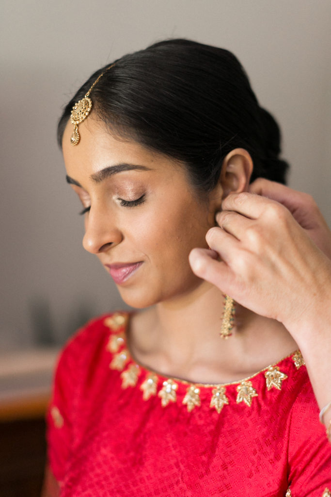 traditional Indian bride getting ready for her wedding day