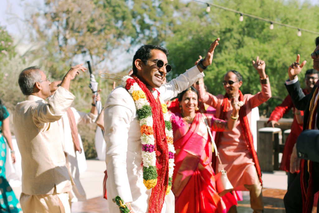 groom arriving for traditional Indian baraat for his wedding at the Environmental Nature Center