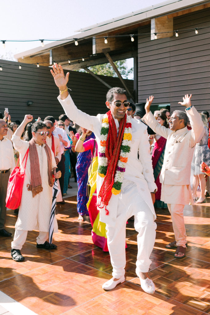 groom arriving for traditional Indian baraat for his wedding at the Environmental Nature Center