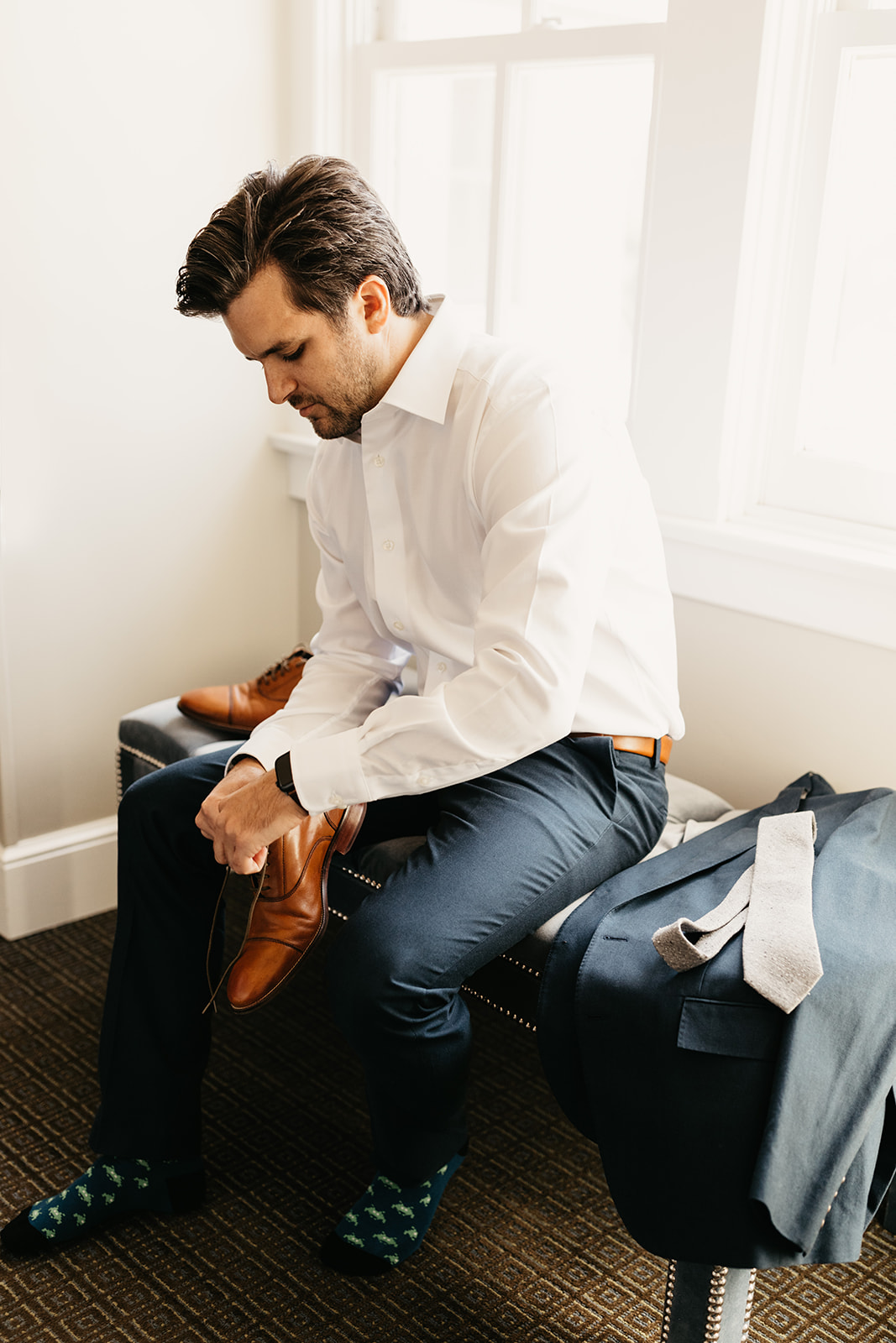 groom getting ready for wedding day