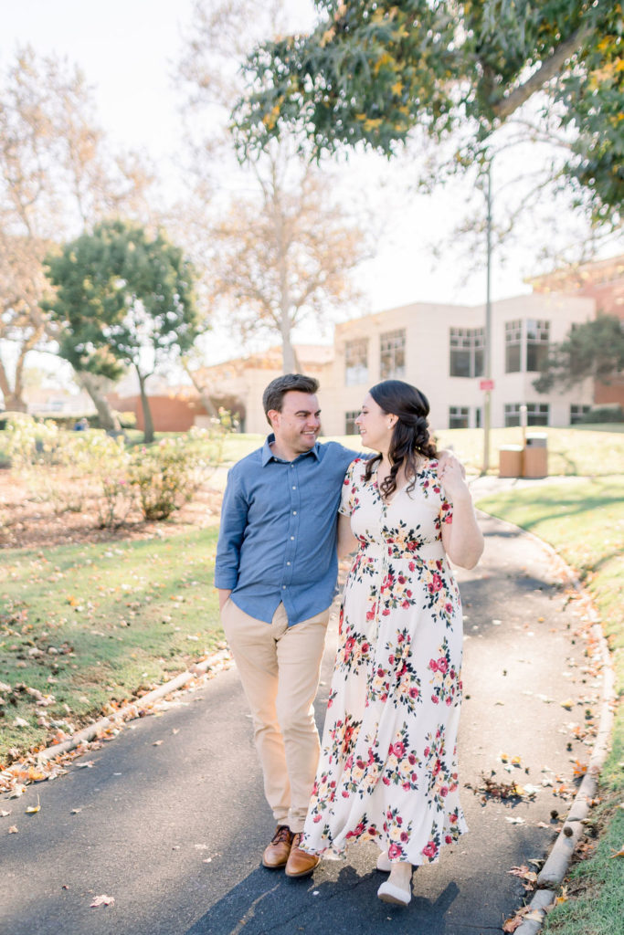 engagement photo session with couple walking in a park in Los Angeles