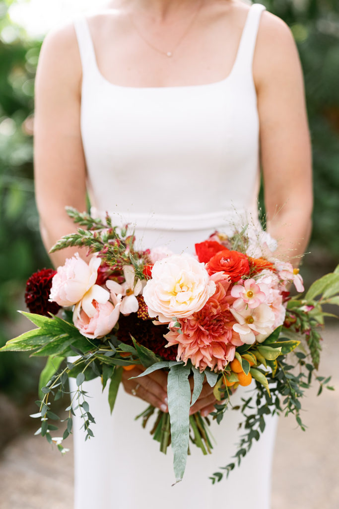pink, orange and red colorful bridal bouquet