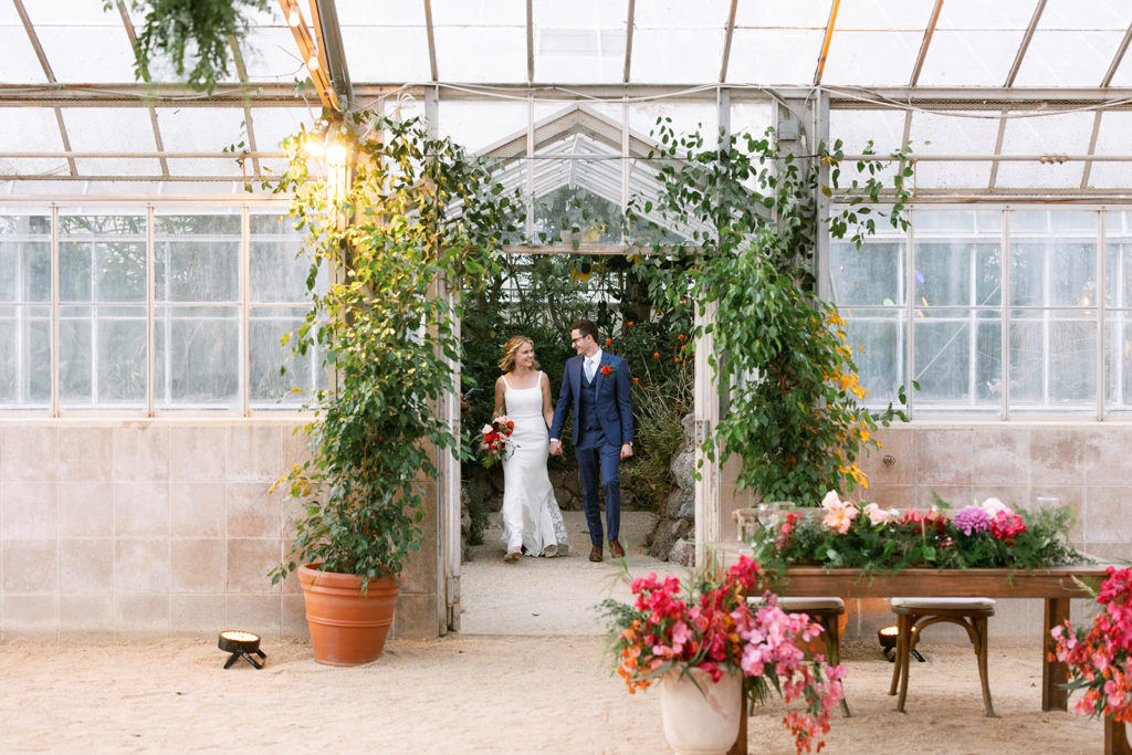 bride and groom enter wedding reception at Dos Pueblos Orchid Farm
