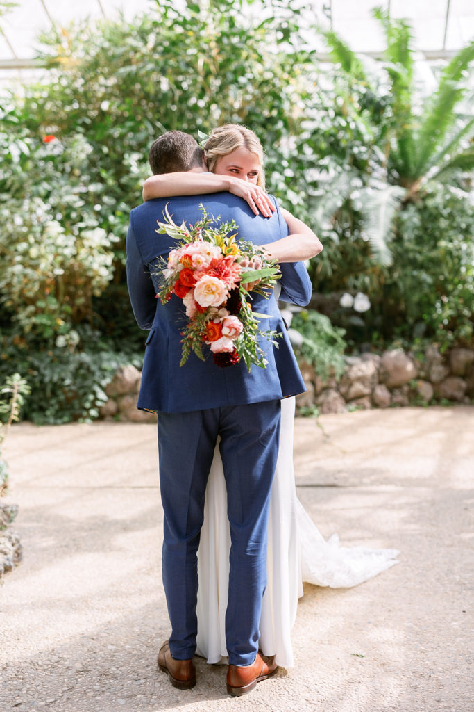 bride and groom first look at Dos Pueblos Orchid Farm