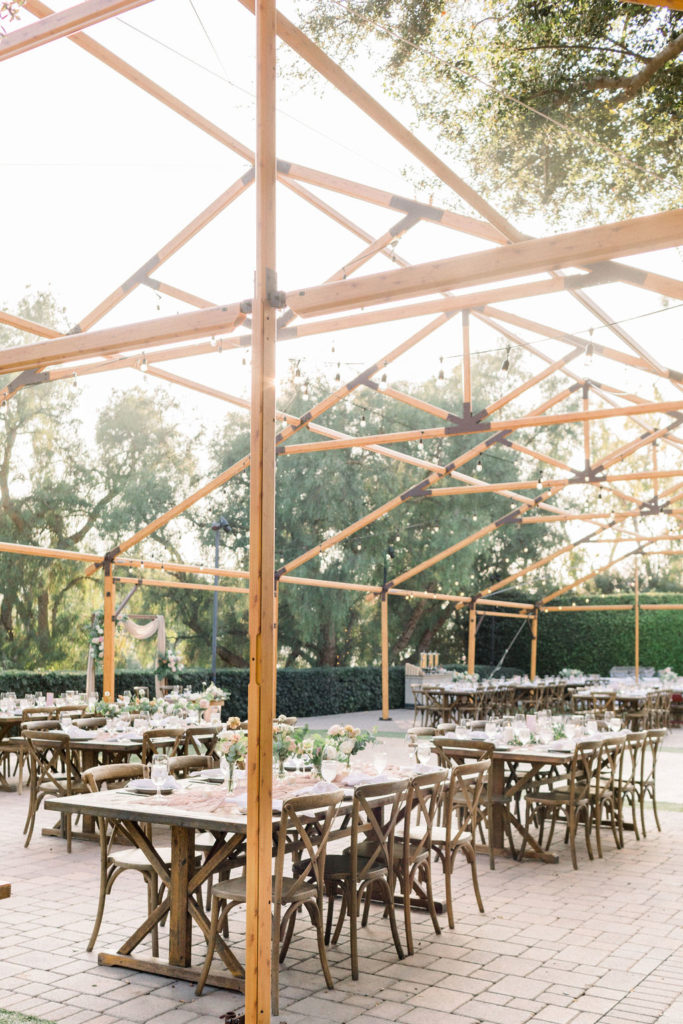 charming wedding reception at Maravilla Gardens with open air build and cafe lights