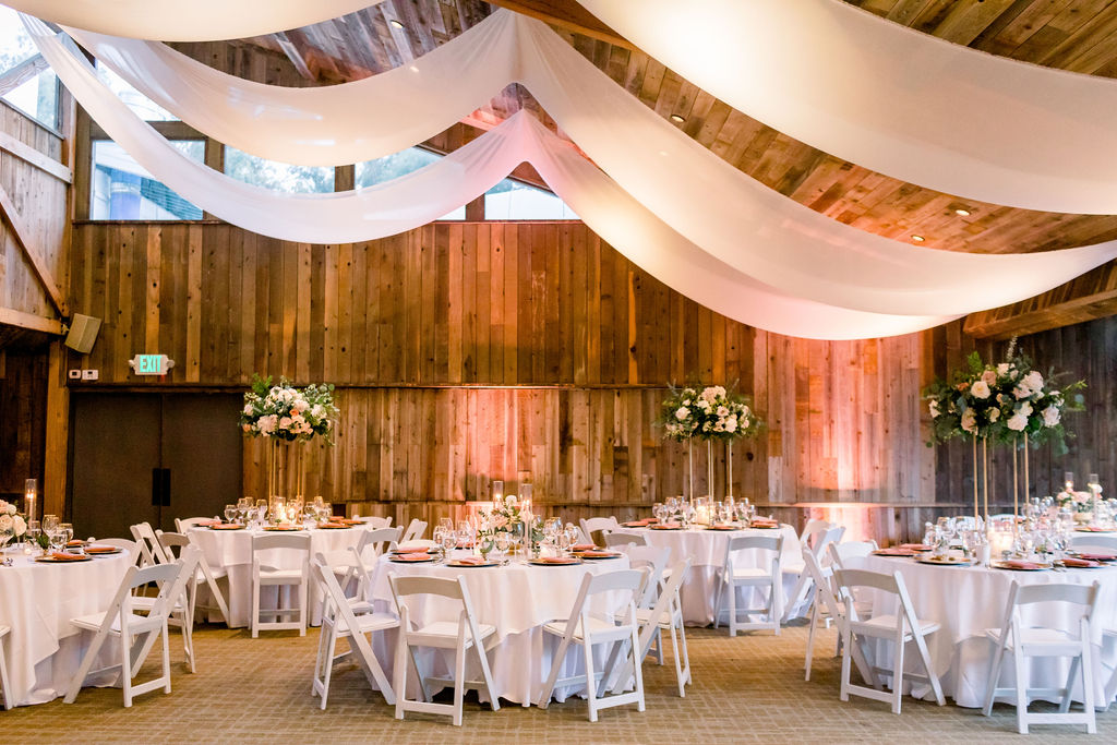 wedding reception with soft pink lights at Calamigos Ranch