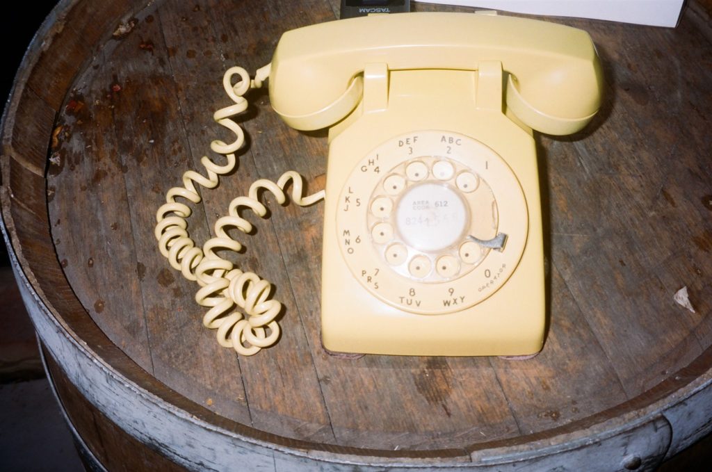 retro phone for guests to leave messages during cocktail hour