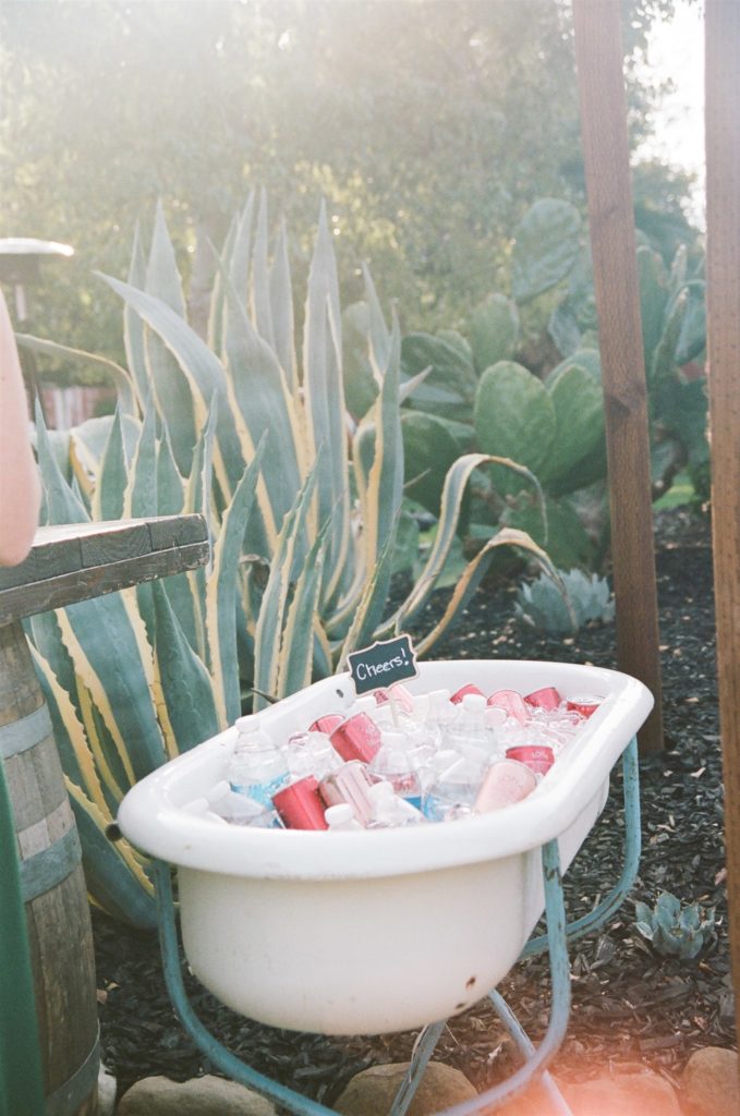 tub filled with ice and drinks during cocktail hour at Ojai Rancho Inn