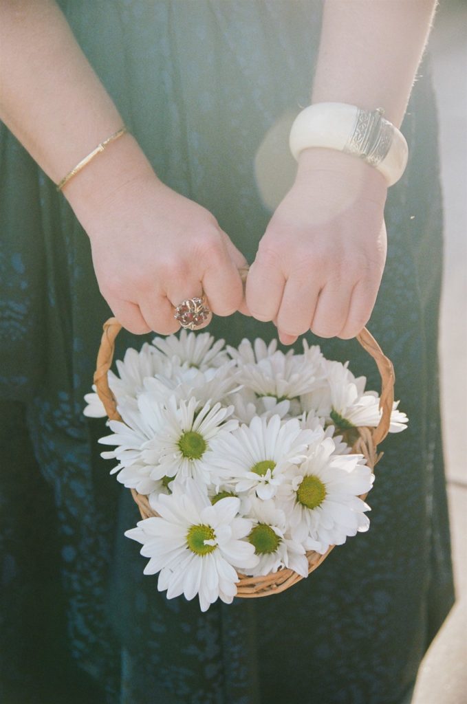 basket of daisies for flower woman
