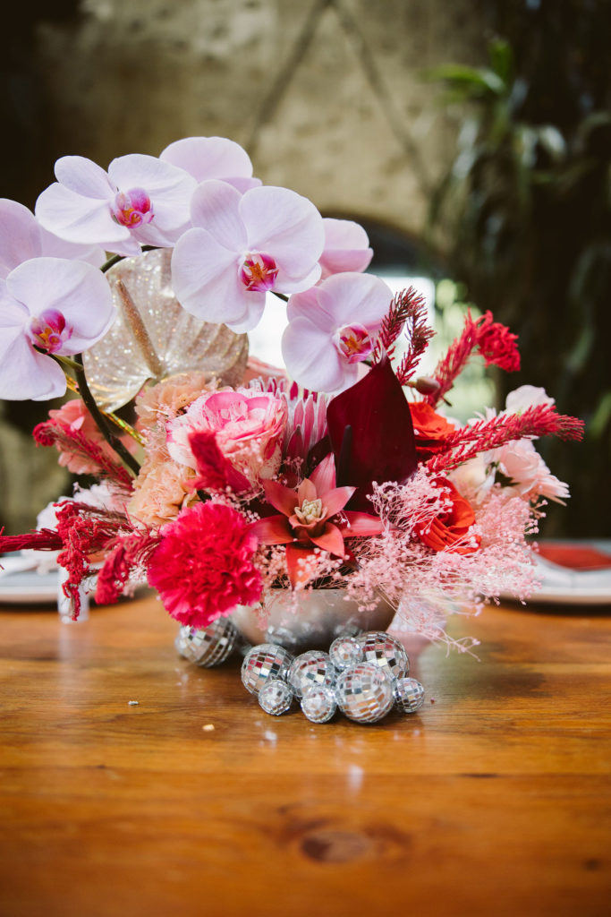 disco inspired wedding reception at Millwick in DTLA with disco balls in centerpieces