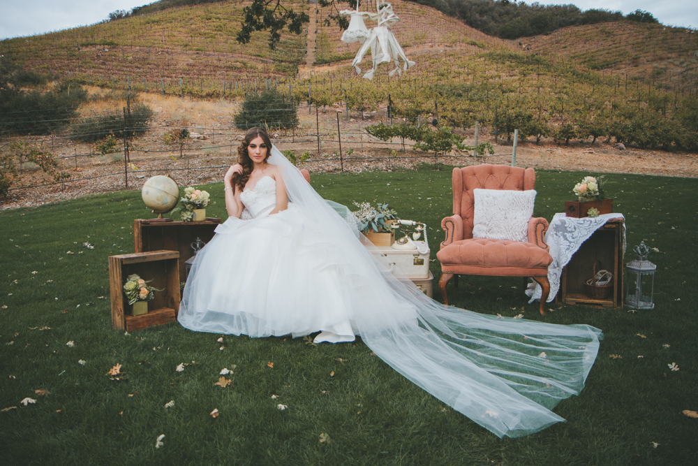 Rustic elegant styled wedding shoot, bride with chapel length gown