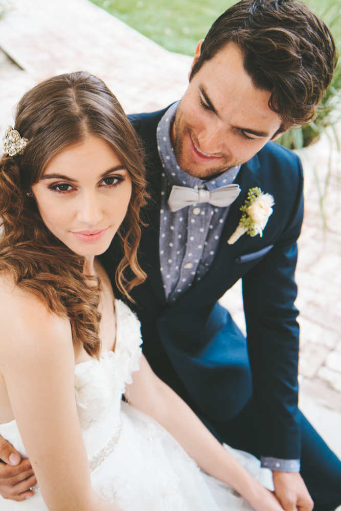Rustic elegant styled wedding shoot, bridal hair and makeup with loose curls and crystal hair piece
