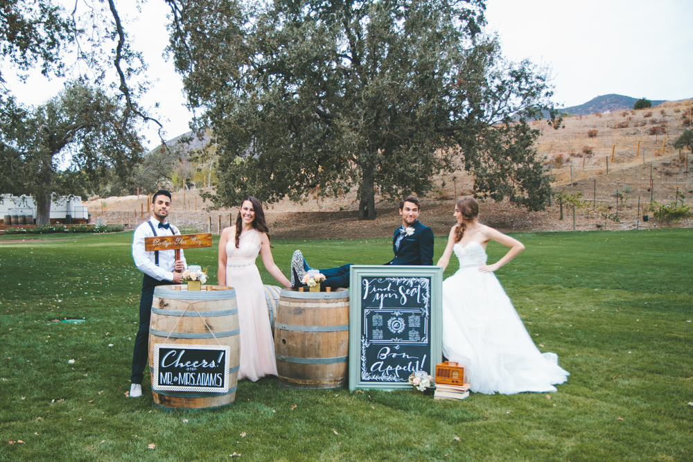 Rustic elegant styled wedding shoot, wedding party photo with chalkboard signage