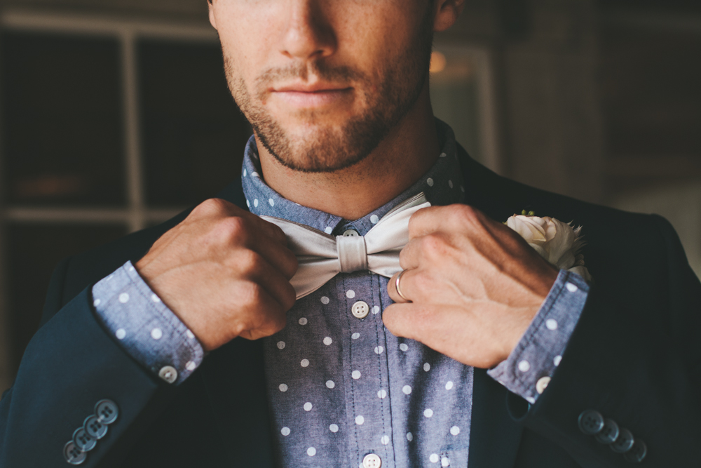 Rustic elegant styled wedding shoot, groom with polka dot shirt and bowtie