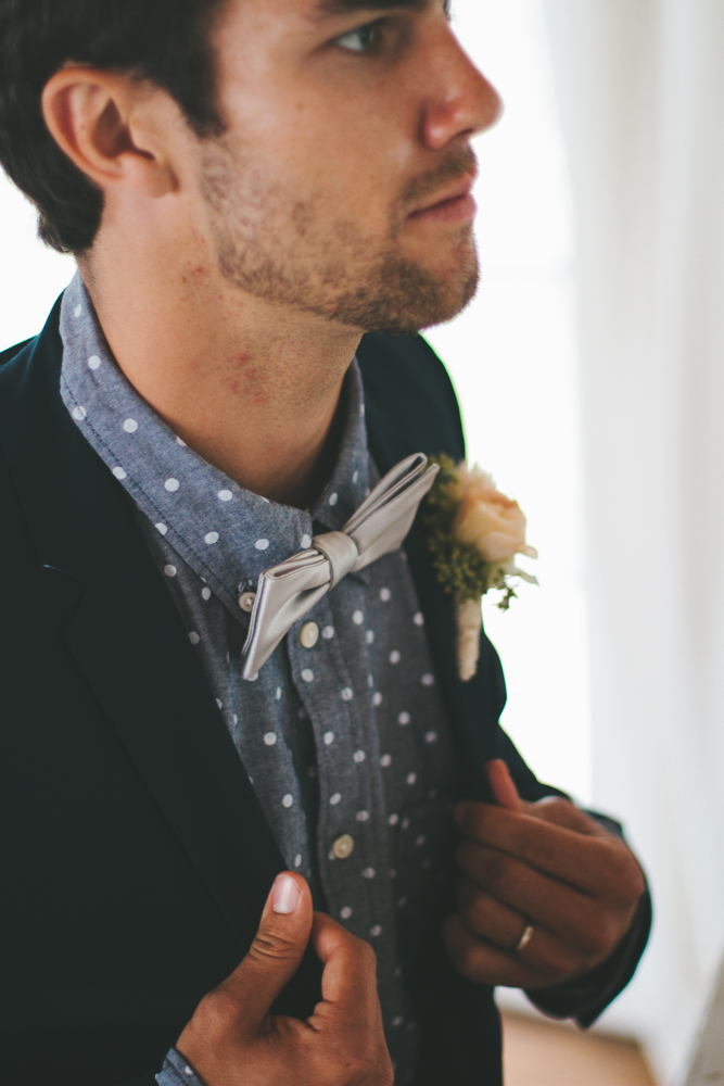 Rustic elegant styled wedding shoot, groom with polka dot shirt and bowtie