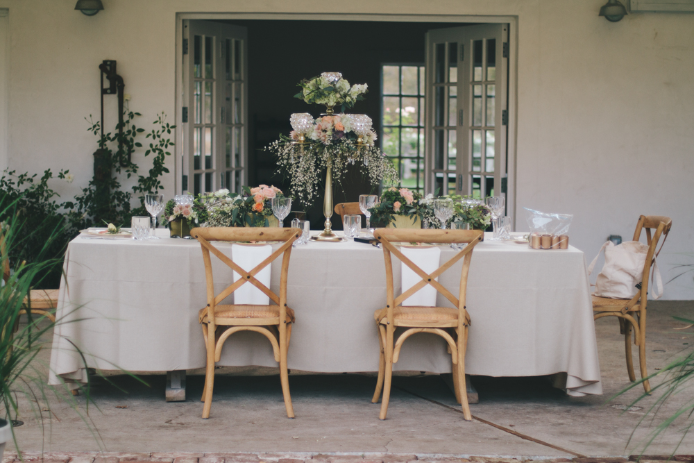 Rustic elegant styled wedding shoot, sweetheart table with crossback chairs