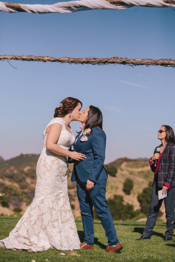 Saddlerock Ranch wedding first kiss between bride and bride