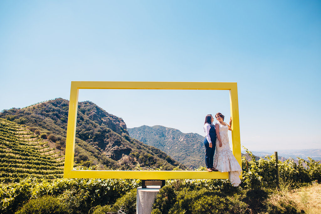 Saddlerock Ranch wedding bride and bride portraits with the yellow frame