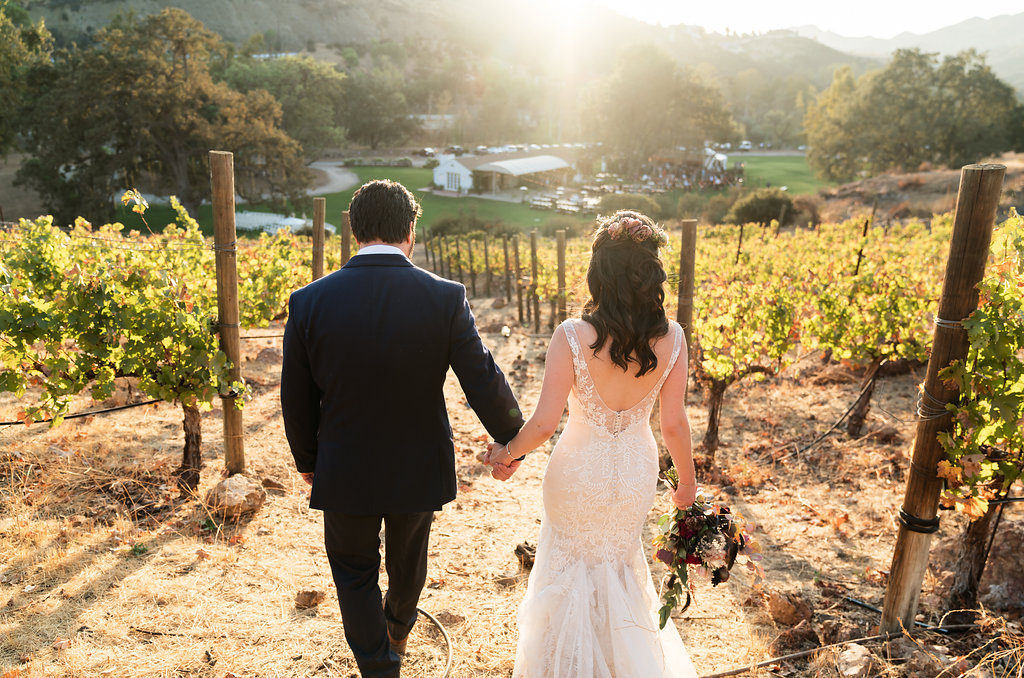 Bride and groom sunset vineyard wedding photos at Triunfo Creek Vineyards