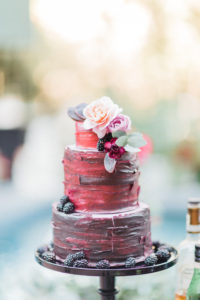 Burgundy wedding cake with berries at Rancho Las Lomas