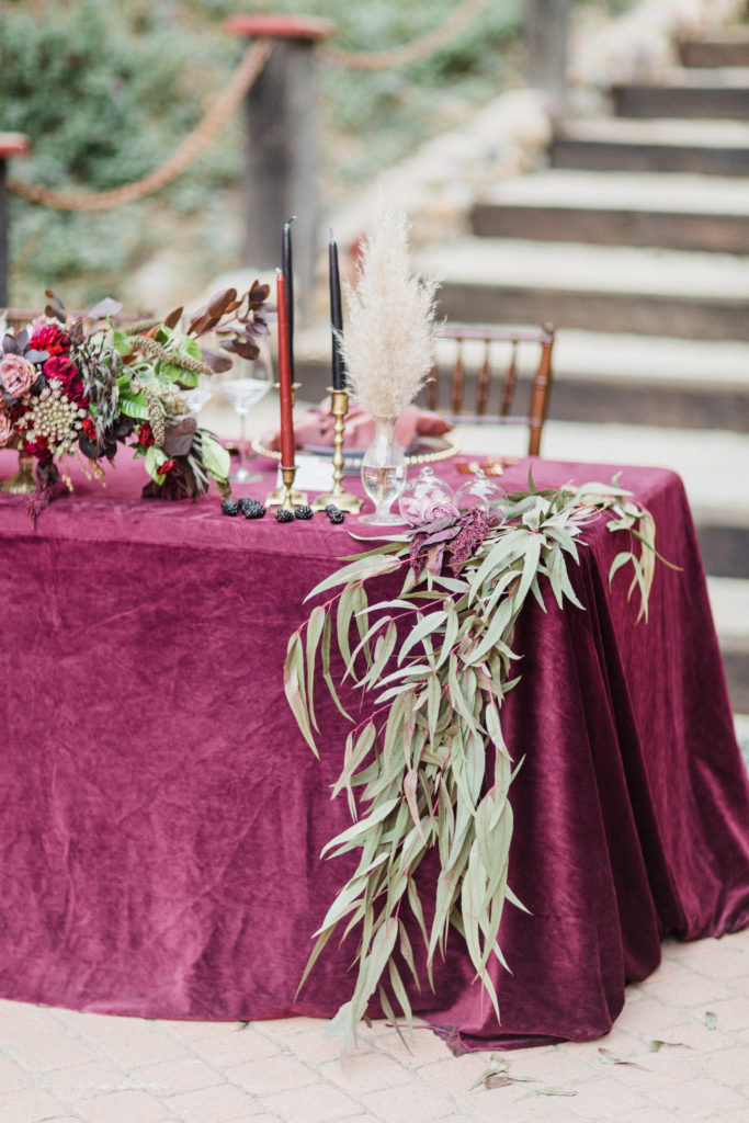La Tavola velvet linens on a Sweetheart Table with velvet linens burgundy color at Rancho Las Lomas