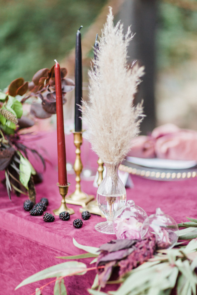 Sweetheart Table with velvet linens burgundy color at Rancho Las Lomas with berries and pampas grass