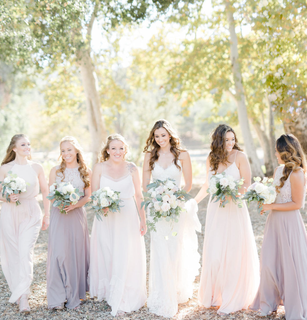 Triunfo creek vineyard wedding bridal party, blush and purple bridesmaid dresses, white flower bouquet