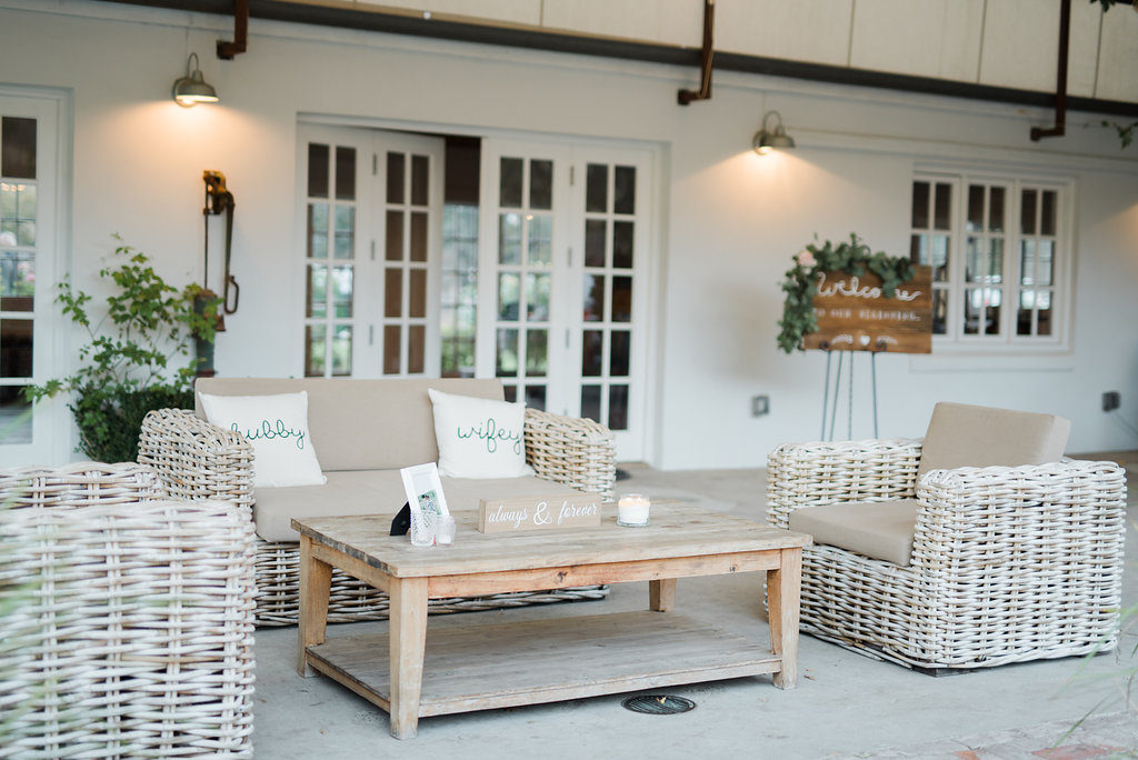 Triunfo creek vineyard wedding reception, lounge area, hubby and wifey pillows
