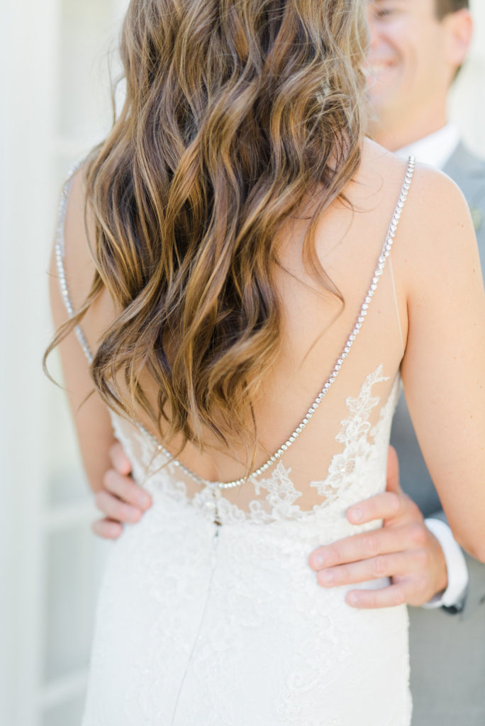 First look, low back wedding dress