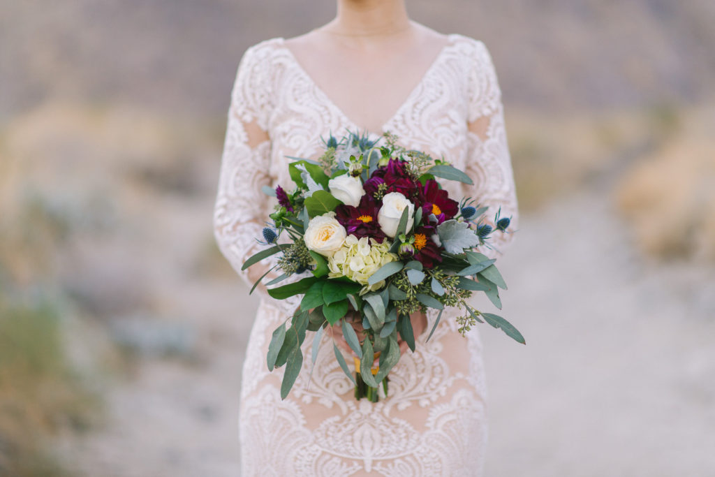 Ace Hotel wedding in Palm Springs wedding, bride and groom desert portrait, desert inspired bouquet