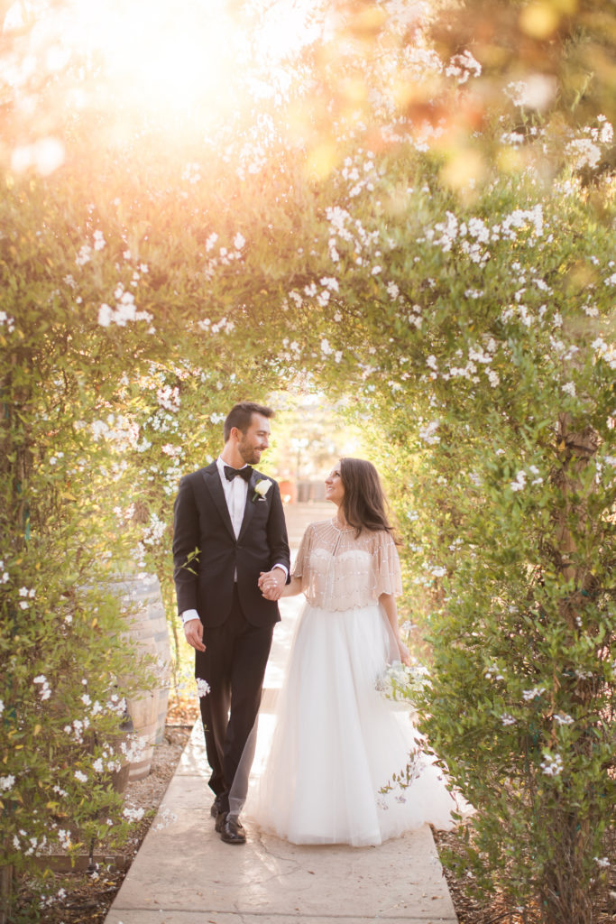 Sogno del fiore wedding in Santa Ynez winery, bride and groom portraits, crystal wedding dress cover