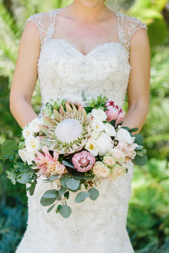 travel themed wedding at Mountain Mermaid, bridal bouquet with king protea flower
