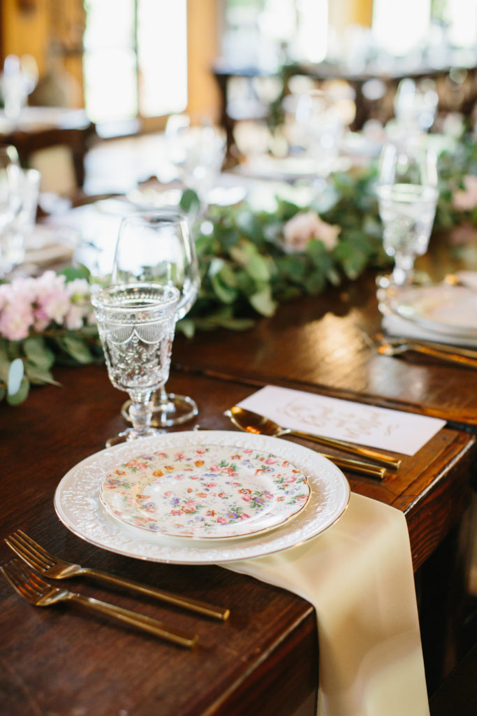 travel themed wedding at Mountain Mermaid, multicultural wedding, farm reception tables with mismatched vintage china