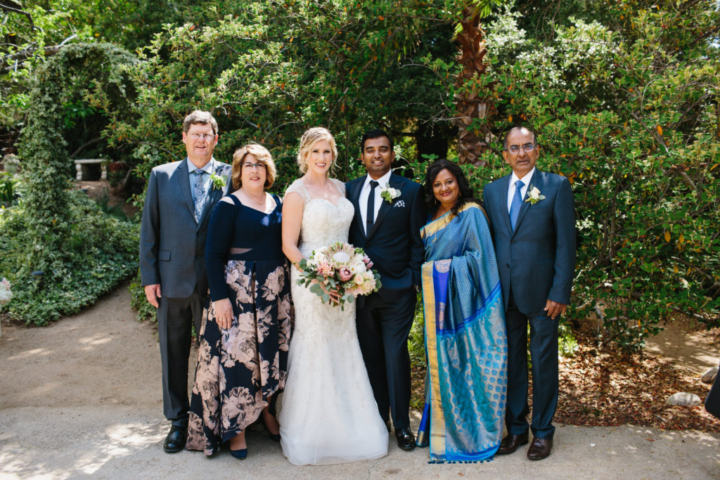 travel themed wedding at Mountain Mermaid, multicultural wedding family photo