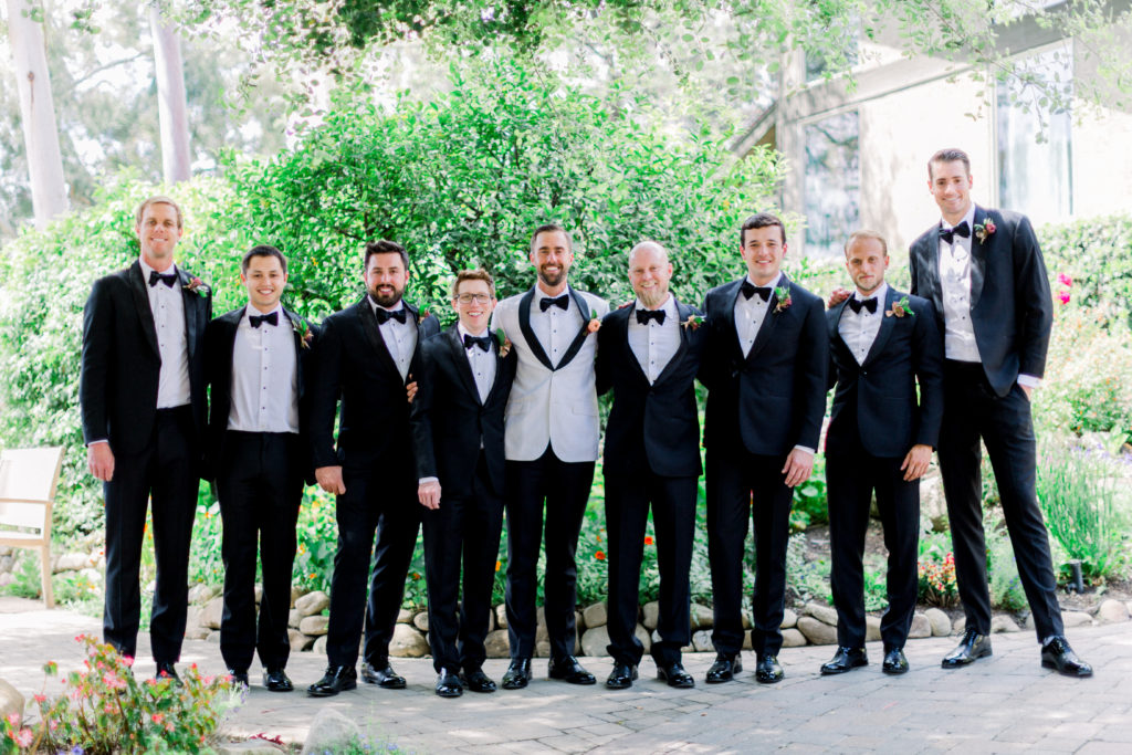 Maravilla Gardens Wedding, groom in white tuxedo jacket, groomsmen in black tuxedos